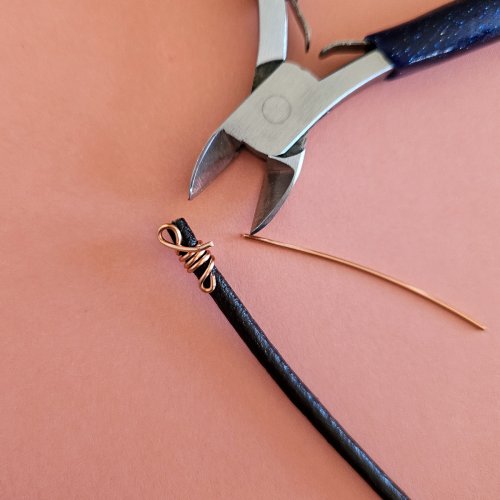 Margot Potter's Falloween Bracelet  - , Contemporary Wire Jewelry, Dapping, Dapping Jewelry, Findings, Clasps, Components, Wire Wrapping, Wrapping, Wire Wrapping Jewelry, Wrap the wire’s end once more around the cord    